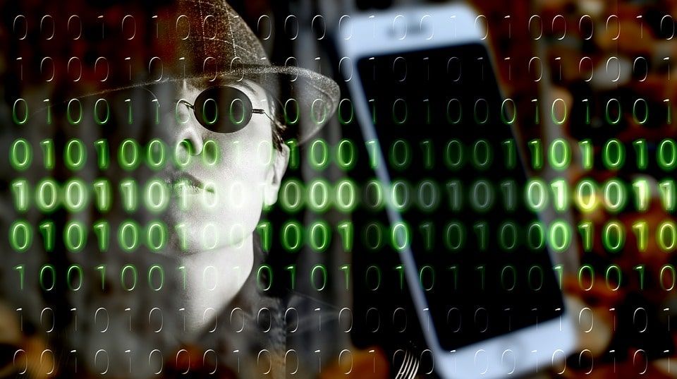 Cybercriminal with a hacked phone